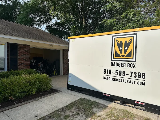 Portable Badger Box storage container in driveway outside a residential home in Wilmington, NC.